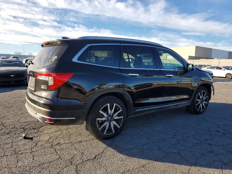 Photo 3 from auction – 2022 HONDA PILOT ELIT with VIN 5FNYF6H00NB066744