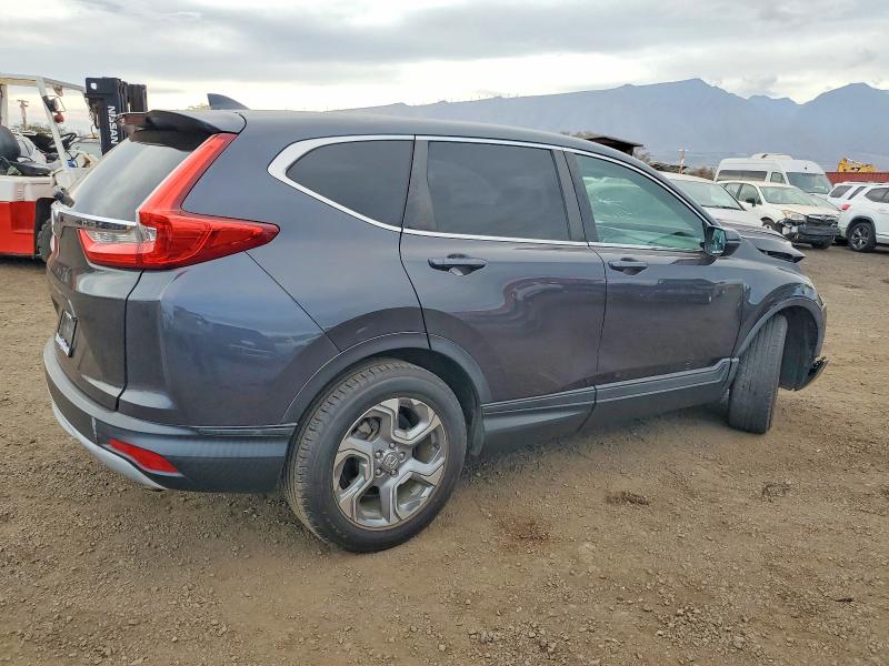 Photo 3 from auction – 2017 HONDA CR-V with VIN 7FARW1H8XHE045082