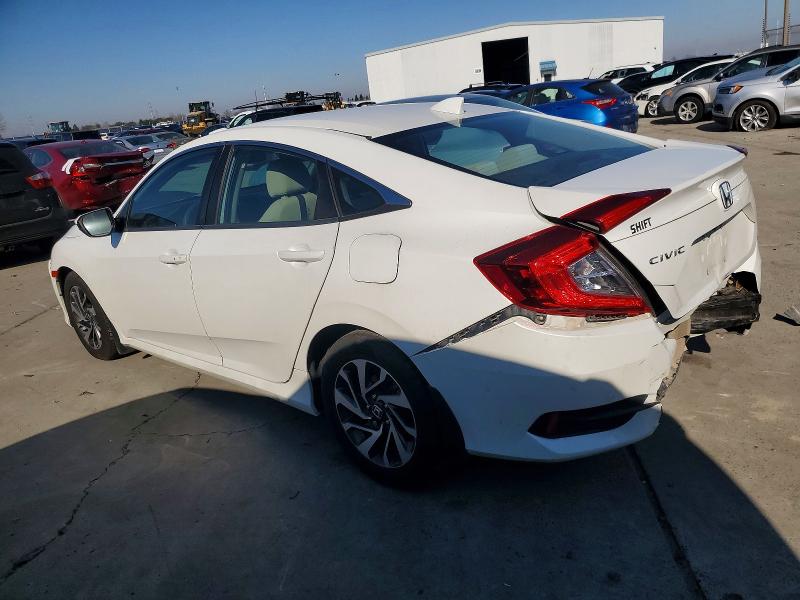 Photo 2 from auction – 2017 HONDA CIVIC EX with VIN 2HGFC2F74HH543359