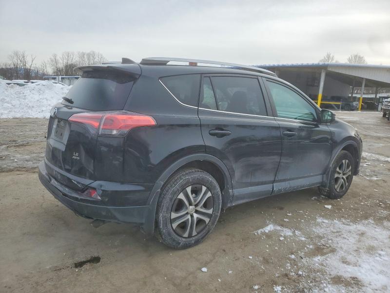 Photo 3 from auction – 2018 TOYOTA RAV4 LE with VIN 2T3BFREV1JW858185