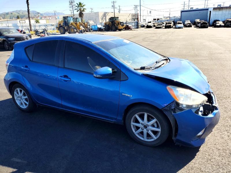 Photo 4 from auction – 2014 TOYOTA PRIUS C with VIN JTDKDTB39E1059295