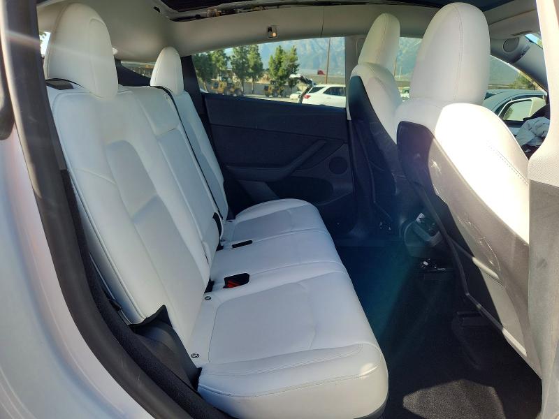 Photo 11 from auction – 2023 TESLA MODEL Y with VIN 7SAYGDEDXPF977551