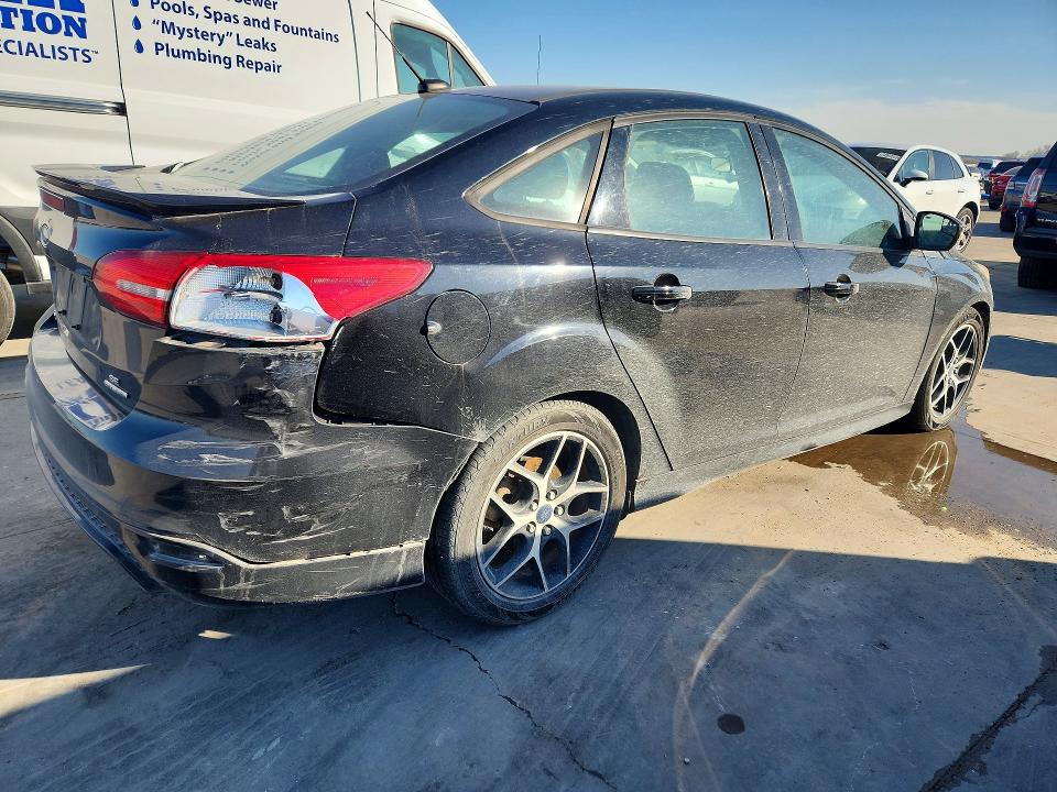 Photo 3 from auction – 2016 FORD FOCUS with VIN 1FADP3F27GL371694