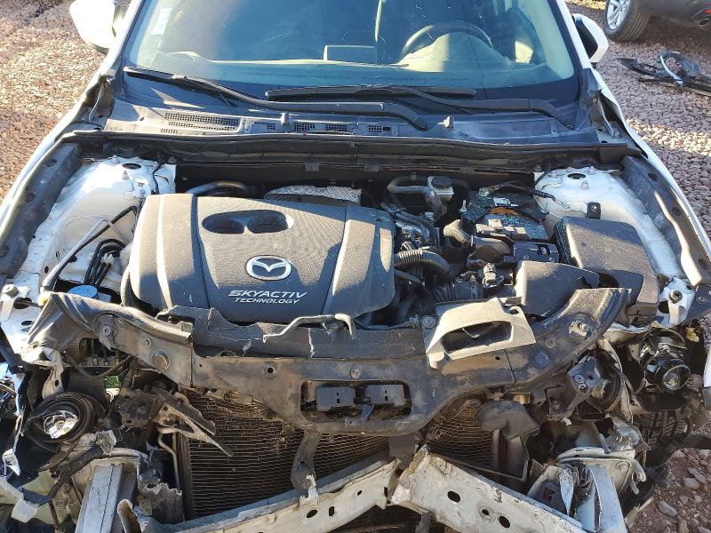 Photo 11 from auction – 2014 MAZDA 3 with VIN JM1BM1K73E1124472