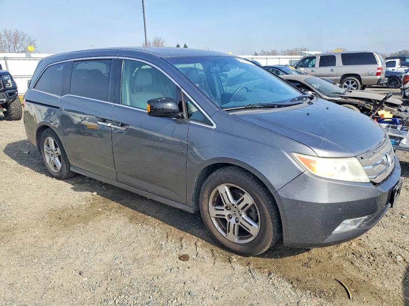 Photo 4 from auction – 2011 HONDA ODYSSEY TO with VIN 5FNRL5H92BB024724