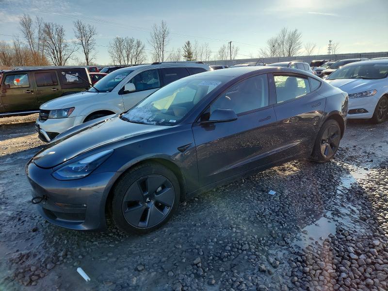 TESLA MODEL 3 2022 with VIN 5YJ3E1EB9NF163964 - Photo from auction