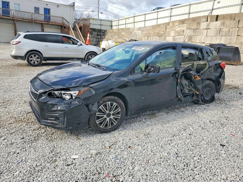 SUBARU IMPREZA 2019 with VIN 4S3GTAA62K3704393 - Photo from auction