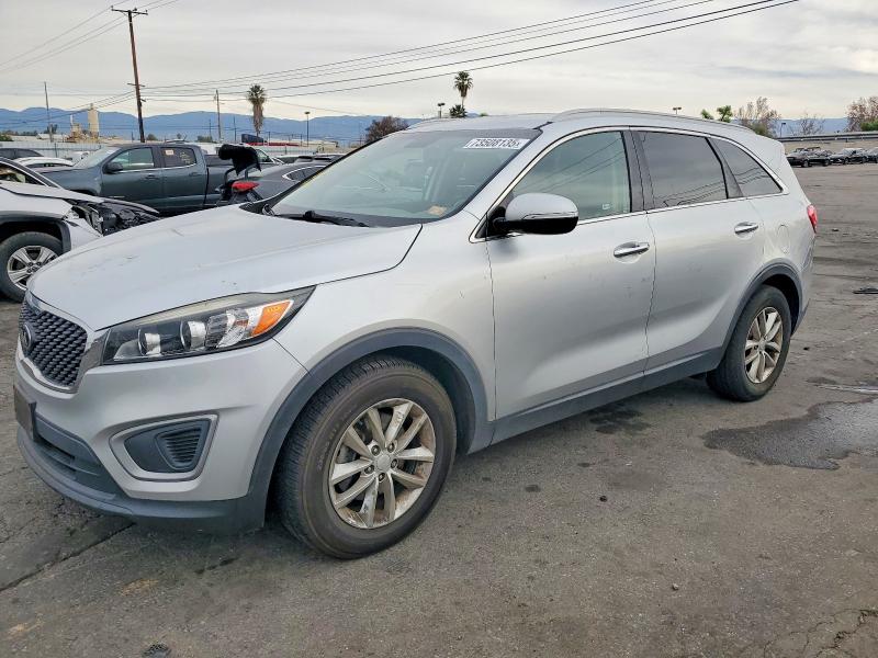 KIA SORENTO 2018 with VIN 5XYPG4A30JG430942 - Photo from auction