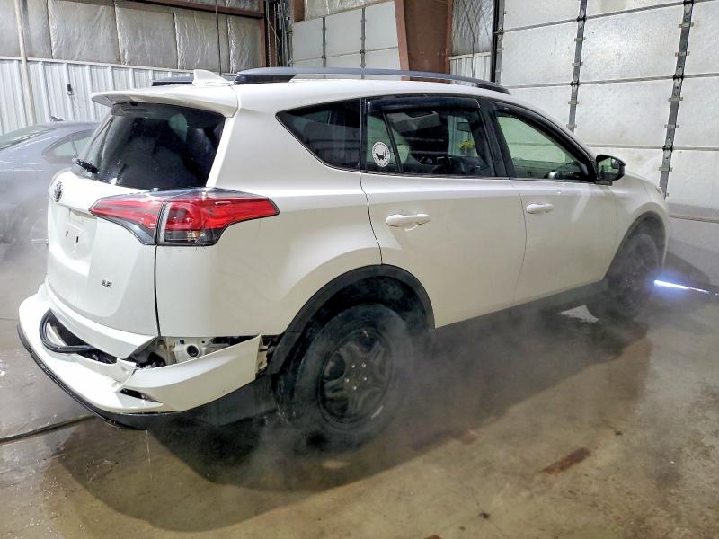 Photo 3 from auction – 2017 TOYOTA RAV4 LE with VIN JTMZFREV7HJ107972