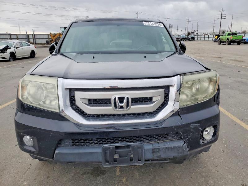 Photo 5 from auction – 2011 HONDA PILOT EX with VIN 5FNYF4H41BB034338