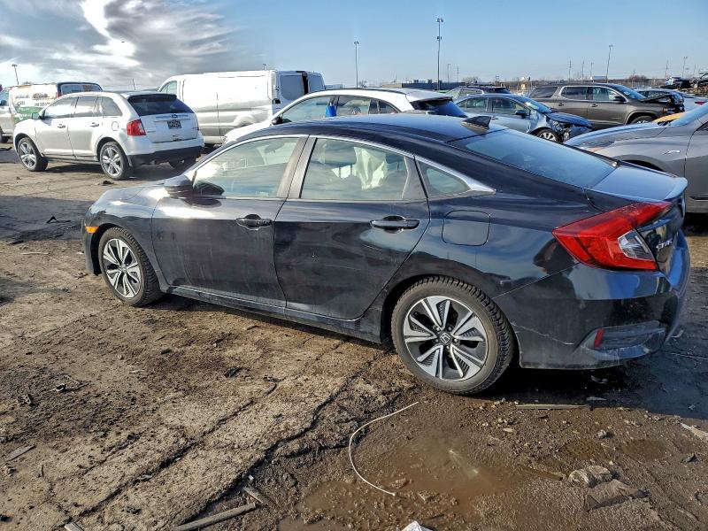 Photo 2 from auction – 2018 HONDA CIVIC with VIN JHMFC1F33JX027855