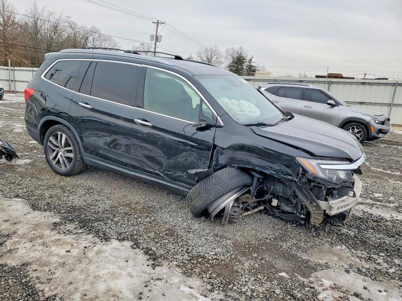 Photo 4 from auction – 2018 HONDA PILOT TOUR with VIN 5FNYF6H93JB051342