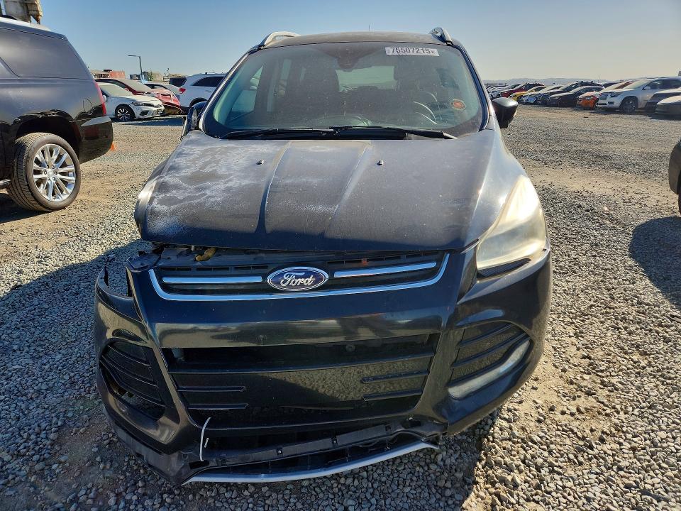Photo 5 from auction – 2016 FORD ESCAPE TIT with VIN 1FMCU0J97GUC14092