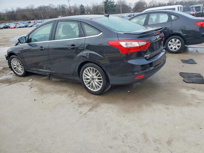 Photo 2 from auction – 2014 FORD FOCUS TITA with VIN 1FADP3J25EL235214