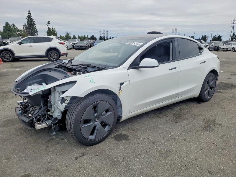 TESLA MODEL 3 2023 with VIN 5YJ3E1EA3PF571547 - Photo from auction