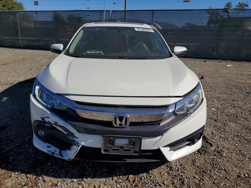 Photo 5 from auction – 2018 HONDA CIVIC with VIN JHMFC1F71JX027159