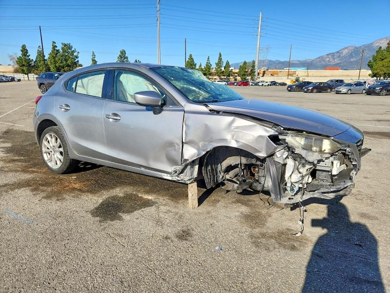 Photo 4 from auction – 2015 MAZDA 3 with VIN JM1BM1L31F1228049