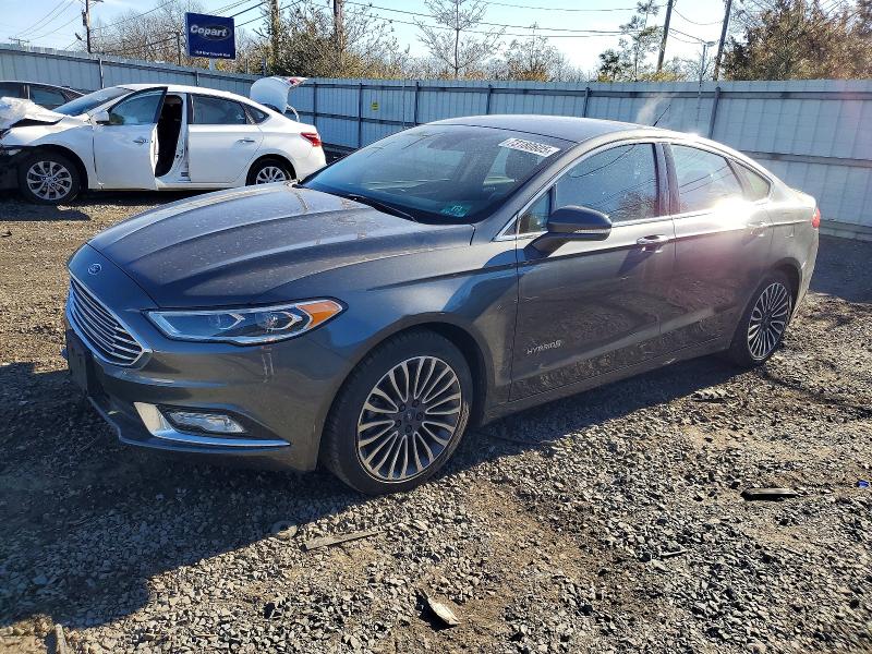 FORD FUSION 2017 with VIN 3FA6P0RUXHR225703 - Photo from auction