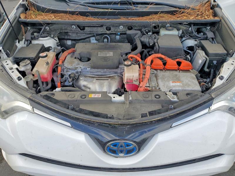 Photo 12 from auction – 2018 TOYOTA RAV4 HV LE with VIN JTMRJREV4JD228106
