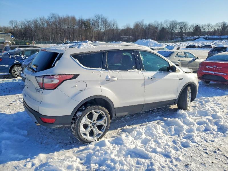 Photo 3 from auction – 2017 FORD ESCAPE with VIN 1FMCU9JD3HUD63822