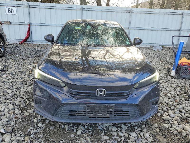 Photo 5 from auction – 2023 HONDA CIVIC SPOR with VIN 2HGFE2F53PH561648