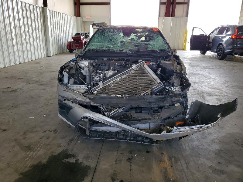 Photo 5 from auction – 2022 HONDA CIVIC SPOR with VIN 2HGFE2F59NH557312