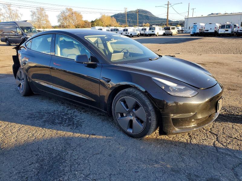 Photo 4 from auction – 2022 TESLA MODEL 3 with VIN 5YJ3E1EB7NF108347