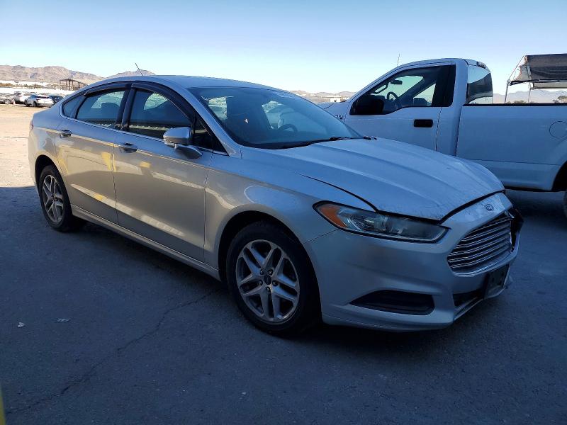 Photo 4 from auction – 2014 FORD FUSION SE with VIN 3FA6P0HD1ER292011