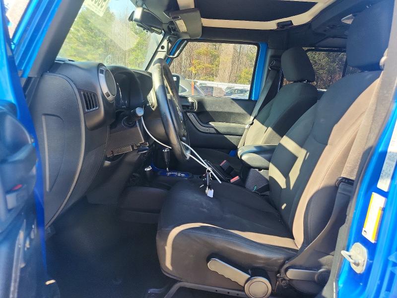 Photo 7 from auction – 2015 JEEP WRANGLER U with VIN 1C4BJWDG4FL675390