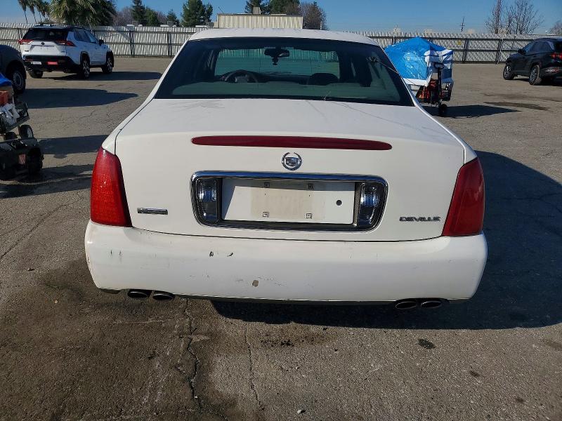 Photo 6 from auction – 2004 CADILLAC DEVILLE with VIN 1G6KD54Y44U114739