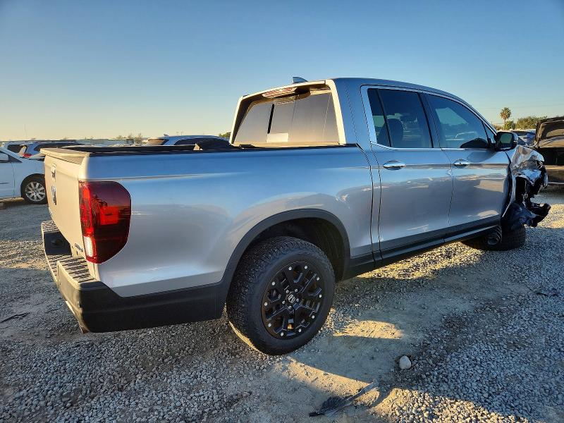 Photo 3 from auction – 2021 HONDA RIDGELINE with VIN 5FPYK3F71MB004768