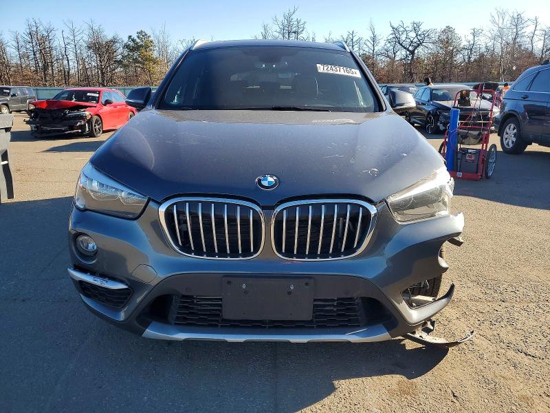 Photo 5 from auction – 2018 BMW X1 XDRIVE2 with VIN WBXHT3C39J5L28980