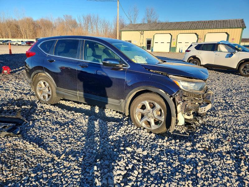 Photo 4 from auction – 2017 HONDA CR-V with VIN 7FARW1H82HE001612
