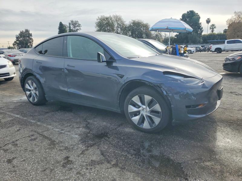 Photo 4 from auction – 2023 TESLA MODEL Y with VIN 7SAYGDED9PF978920