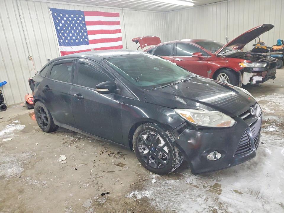 Photo 4 from auction – 2013 FORD FOCUS with VIN 1FADP3F2XDL380787