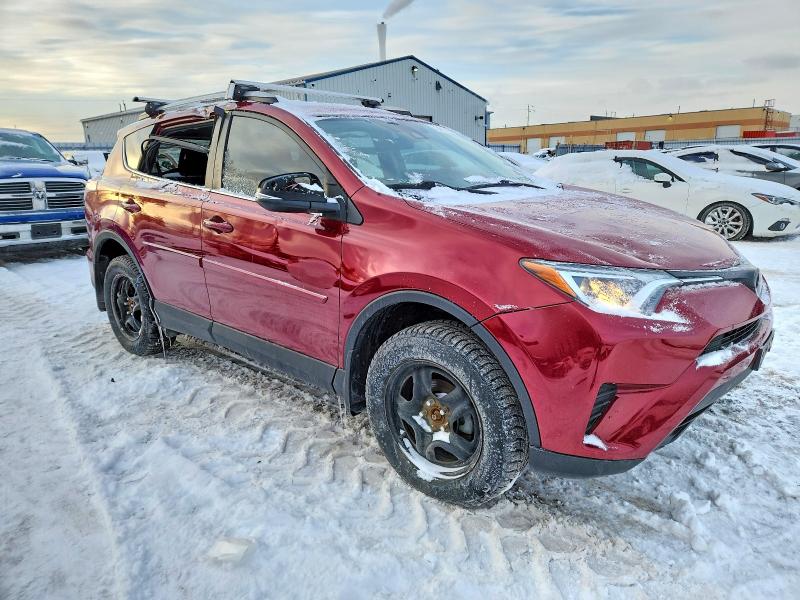 Photo 4 from auction – 2018 TOYOTA RAV4 LE with VIN 2T3ZFREV7JW506470