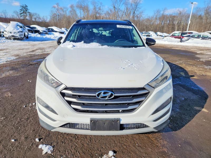 Photo 5 from auction – 2017 HYUNDAI TUCSON with VIN KM8J3CA27HU548865