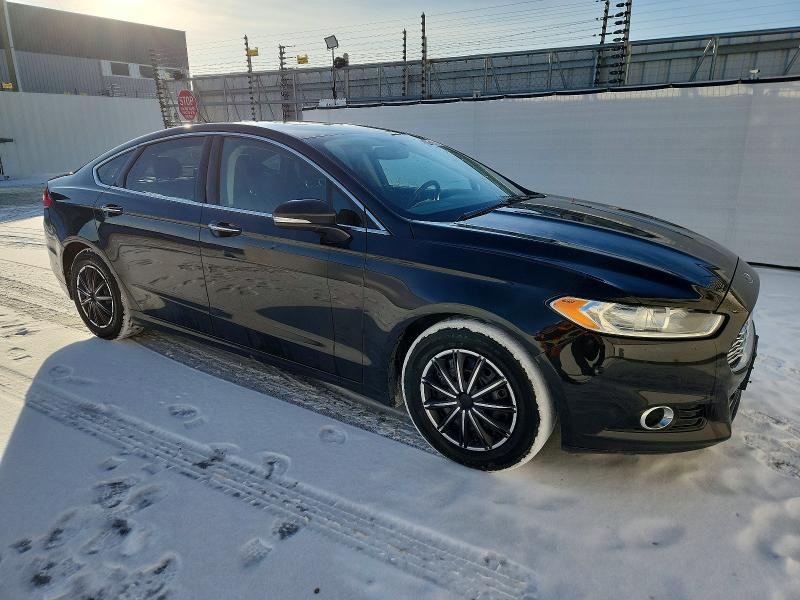 Photo 4 from auction – 2015 FORD FUSION TIT with VIN 3FA6P0D98FR270543