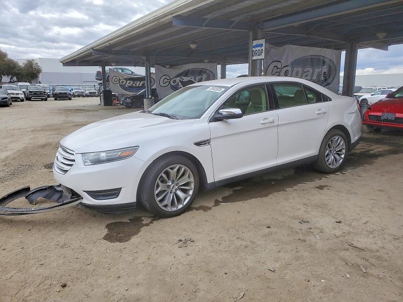 FORD TAURUS 2015 with VIN 1FAHP2F8XFG102726 - Photo from auction
