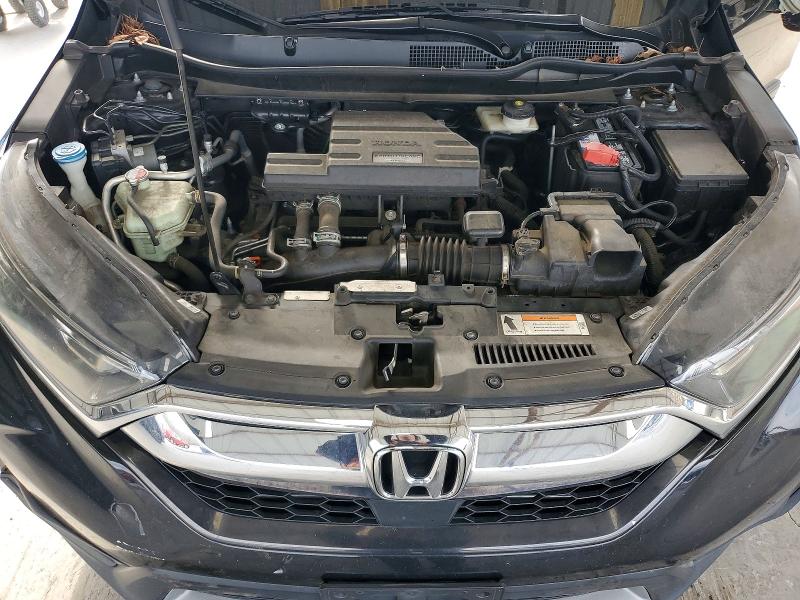Photo 11 from auction – 2017 HONDA CR-V with VIN 7FARW1H87HE017563