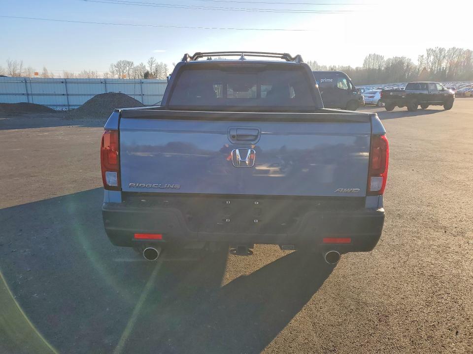 Photo 6 from auction – 2023 HONDA RIDGELINE with VIN 5FPYK3F83PB053936