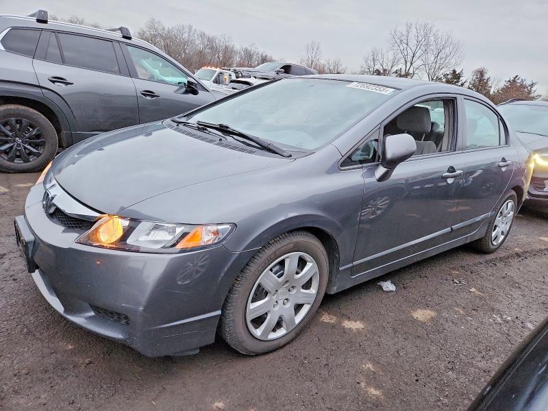 HONDA CIVIC LX 2011 with VIN 2HGFA1F55BH302853 - Photo from auction