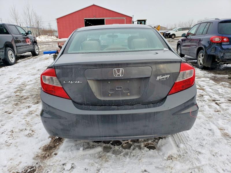 Photo 6 from auction – 2012 HONDA CIVIC LX with VIN 2HGFB2F41CH053883