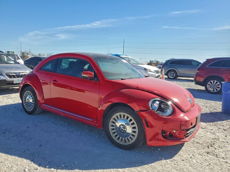 Photo 4 from auction – 2014 VOLKSWAGEN BEETLE with VIN 3VWJX7AT6EM630947