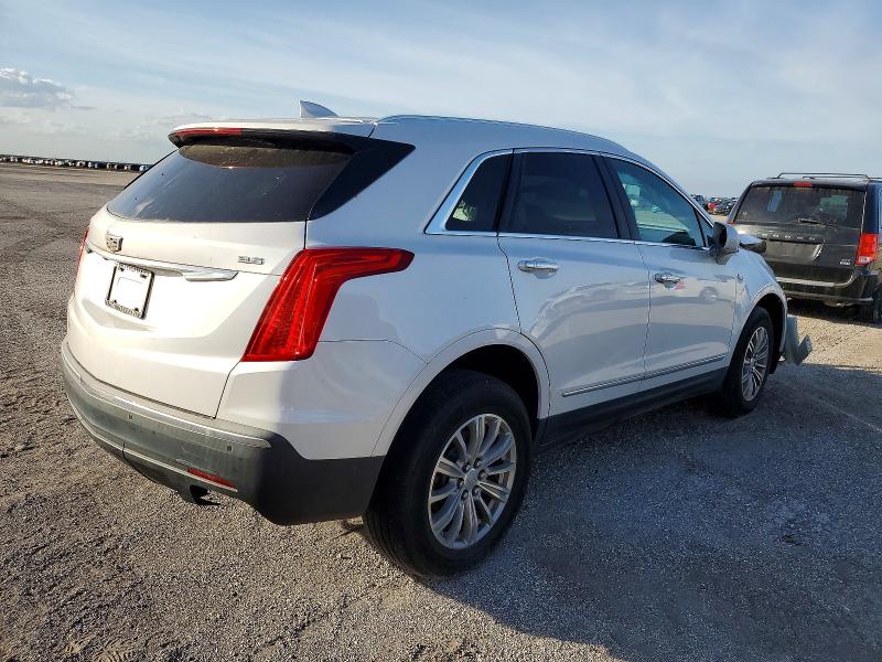 Photo 3 from auction – 2018 CADILLAC XT5 with VIN 1GYKNCRS8JZ182473