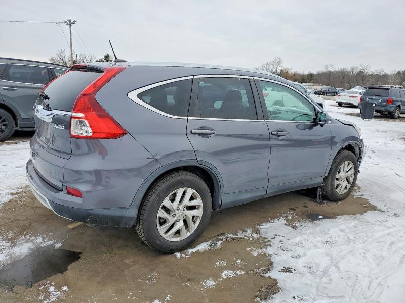 Photo 3 from auction – 2016 HONDA CR-V EXL with VIN 2HKRM4H70GH669189