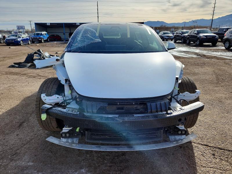 Photo 5 from auction – 2022 TESLA MODEL 3 with VIN 5YJ3E1EC1NF132765