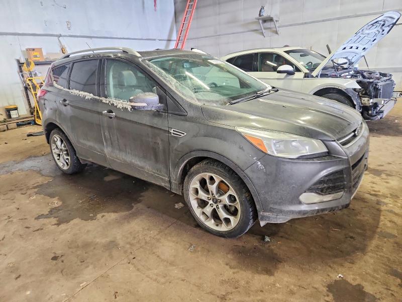 Photo 4 from auction – 2015 FORD ESCAPE TIT with VIN 1FMCU9J96FUB78852