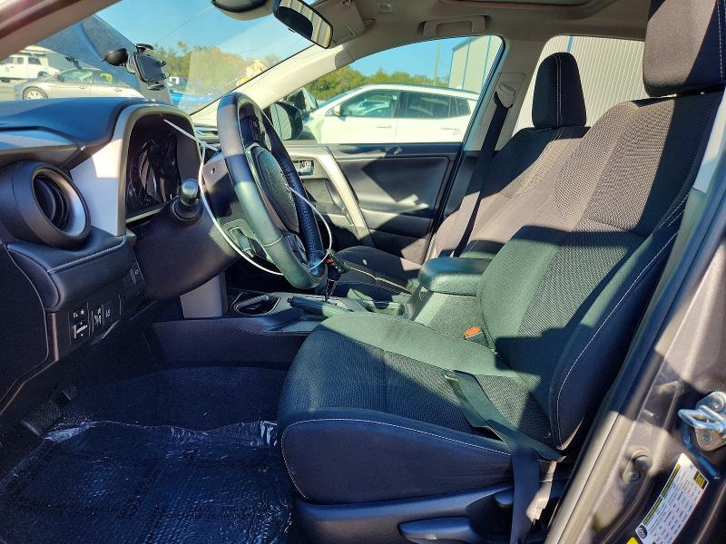 Photo 7 from auction – 2018 TOYOTA RAV4 with VIN 2T3WFREV8JW499144
