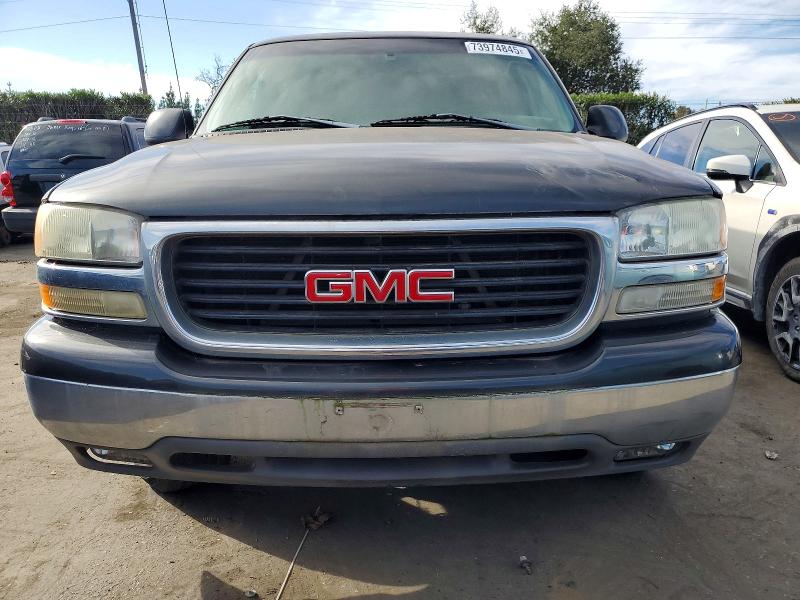 Photo 5 from auction – 2003 GMC YUKON with VIN 1GKEC13V43R257211